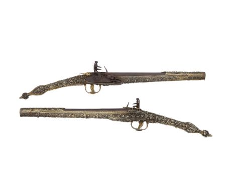 A Brace Of Albanian 18-Bore Flintlock (Epirot) Pistols With Silver-Gilt Stocks  19th CenturyWith earlier russet barrels, one 