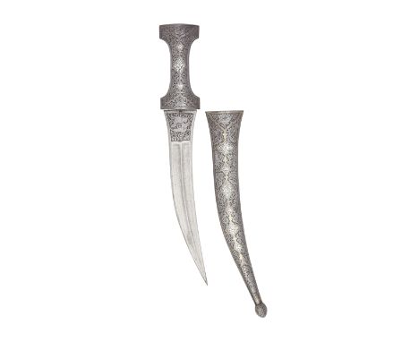 A Persian All-Metal JambiyaQajar, 19th CenturyWith curved sharply pointed double-edged blade cut with two fullers over most o