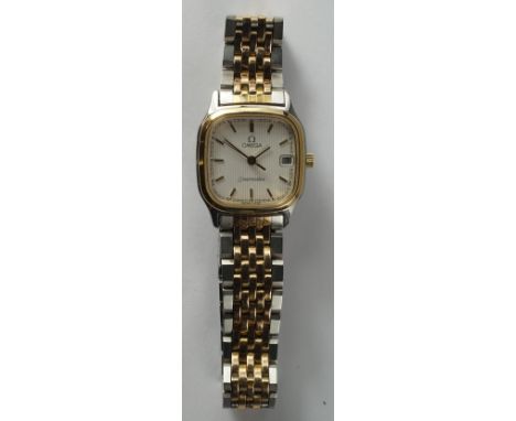 An steel and gold plated Omega Seamaster quartz ladies wrist watch, the case of curved square form, gilt batons, seconds swee