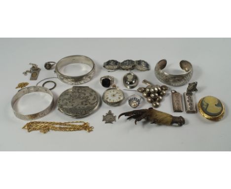 A quantify of silver jewellery to include a Charles Horner engraved silver adjustable bangle, Chester 1940, an engraved torqu