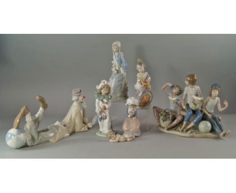 A Lladro porcelain Nativity group of Jesus, Mary and Joseph, 20th century, the main figure 19.5cm high, together with a group