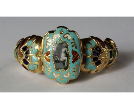 A rare enamel locket ring, 19th century, the hinged cover with enamelled picture of a recumbent dog on a cushion, the cast sh