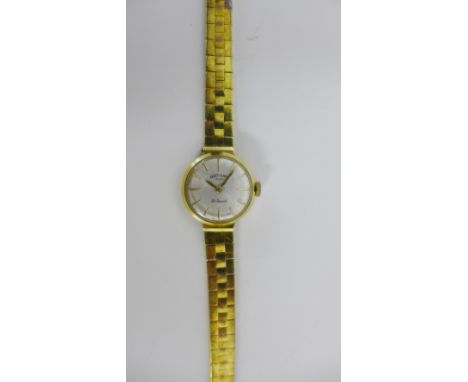 A lady's 14 carat gold Rotary wristwatch on gold bracelet strap, fully hallmarked and stamped 585 