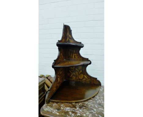 A mahogany and marquetry inlaid three tier corner shelf bracket, 50 x 45cm