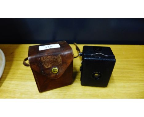 A Zeiss Ikon vintage miniature camera in a leather fitted case
