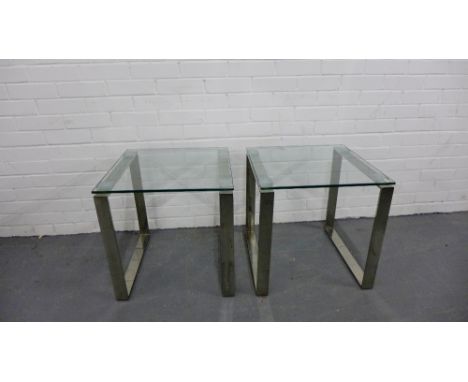 A pair of contemporary glass topped lamp tables on brushed metal supports, 50 x 50cm (2)
