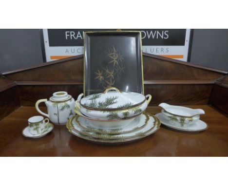 A Japanese white porcelain bamboo patterned dinner service comprising tureens, ashets, sauce boat, dinner plates, side plates