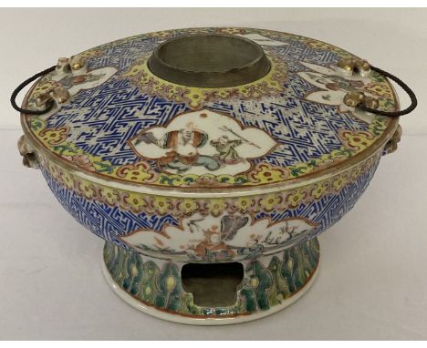 An antique hand painted ceramic wine warmer. Lif off lid with 2 letal loop handles and decorated with figural panel designs. 