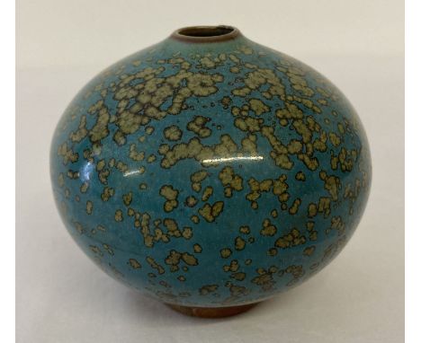 A green speckled glazed Chinese ceramic water dropper of bulbous form.  Approx. 9cm tall x 9.5cm diameter.