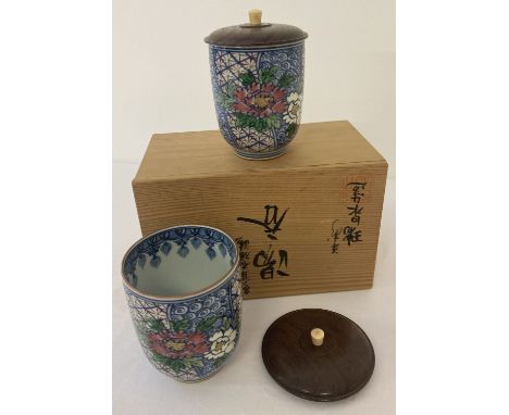 2 boxed, hand painted ceramic jars with wooden and bone handles. Hand painted and gilt floral detail to outer bowl, with blue