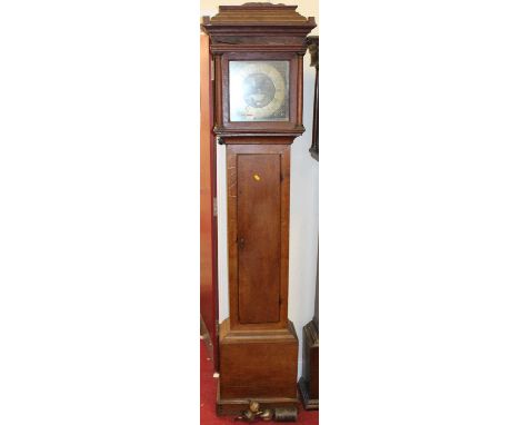 A circa 1800 provincial oak long case clock, the brass square dial with date aperture and signed William Flint, Charing, with