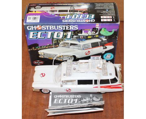 A kit built model of  a Polar Lights Ghostbusters Ecto 1 car, housed in the original box, built to a nice standard, with inst