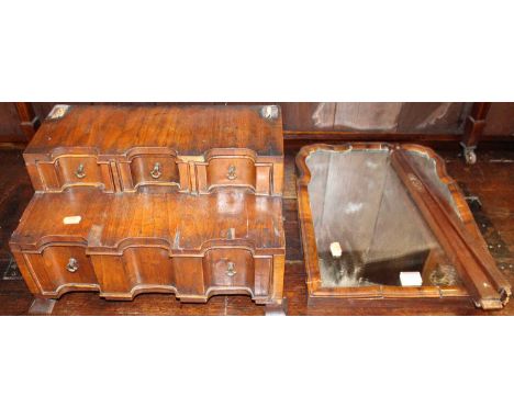 An 18th century walnut dressing mirror, having four drawer stepped box base (requires restoration and some reassembling)