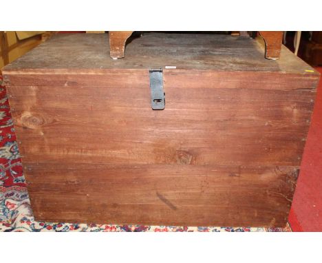 An early 20th century hardwood hinge top military travelling trunk, titled A.G. TAYLOR P.W.D. BURMA, width 96cm