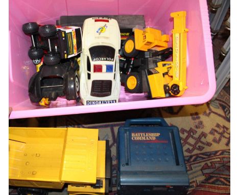 A box of large scale toys to include Tonka, Battleship Commander playset, Polar Cop, plastic electronic car, Batmobile and ot