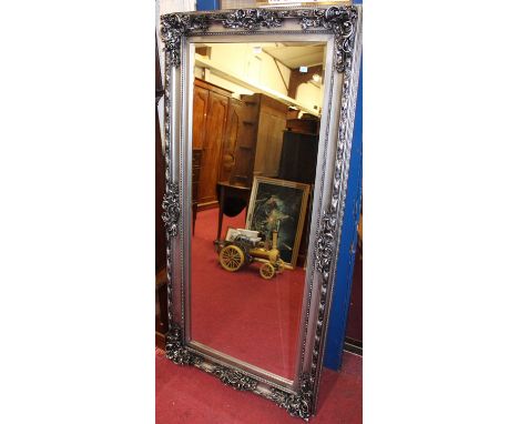 A large contemporary floral silvered framed bevelled rectangular floor mirror, 172 x 84.5cm