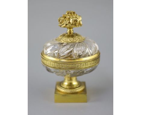 A French cut glass and ormolu urn shaped ink stand, second quarter 19th century, the glass possibly Baccarat, slice and straw