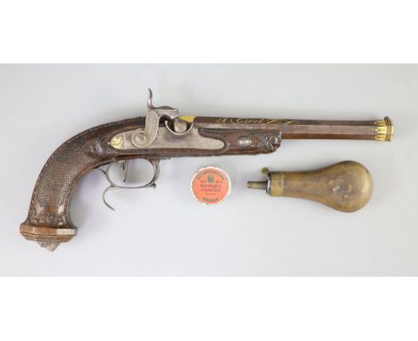 A late 18th/ early 19th century French gold inlaid pistol by Henraux with finely carved walnut stock, lions mask butt, flower