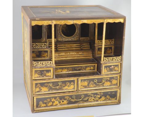 A Japanese gilt decorated black lacquer shrine cabinet, 19th century, the top and sides decorated with figures in landscapes,