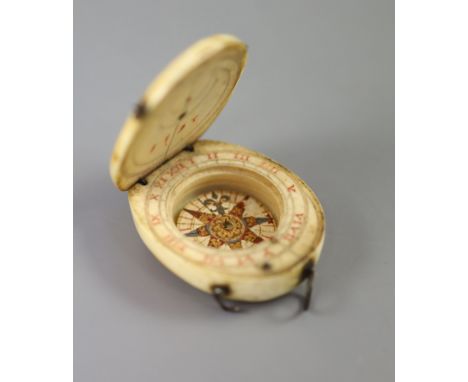 A rare late 16th century German oval ivory diptych-dial, the upper inner leaf with tangent circles and inscribed 1593, the lo