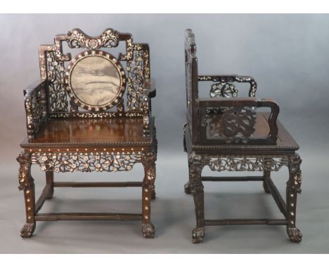 An impressive pair of Chinese hongmu and mother of pearl inlaid throne armchairs, c.1910, each decorated with bats, gourds, p