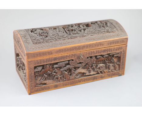 A large Chinese carved sandalwood box, 19th century, the domed top and sides carved in high relief and openwork with figures 