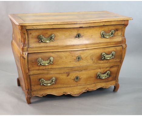 A 19th century Continental walnut serpentine commode, fitted three long drawers with brass loop handles, on reduced scroll fe
