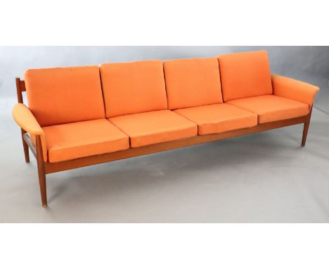 A Grete Jalk for France &amp; Son four seater sofa, with original burnt orange cloth upholstery and teak frame, W.8ft 1in. D.