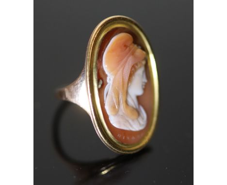 A 19th century gold and oval cameo sardonyx set ring, carved with the bust of a lady to sinister, signed in Greek 'HIXAEP' be