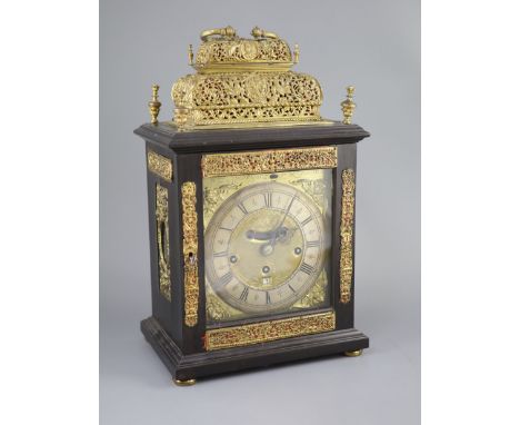 A William III ebonised cased and gilt metal double basket topped chiming and quarter repeating table clock, the 7 inch square