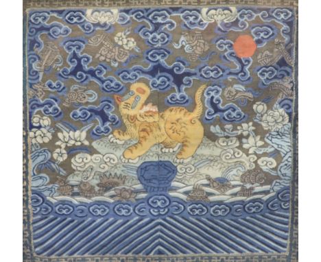 A Chinese kesi 'tiger' military fourth rank badge, late Qing dynasty, repeating 'wan' border, 27.5 x 28.5cm excluding frame P