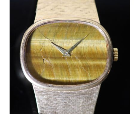 A gentleman's 1970's 9ct gold Bueche Girod manual wind dress wrist watch, on a 9ct gold bracelet, with tiger's eye quartz dia