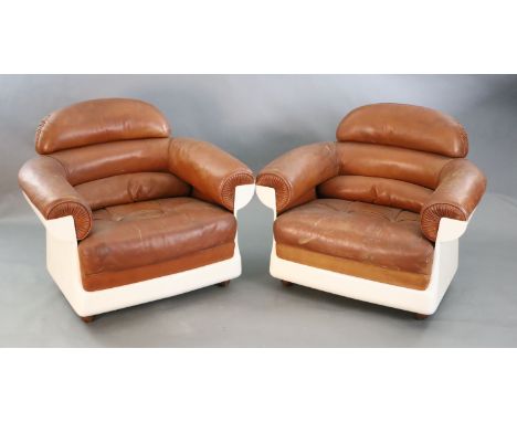 A pair of mid century tan leather and fibreglass tub chairs, possibly French, by Airbourne, W.3ft 1in. D.2ft 7in. H.2ft 8in.C