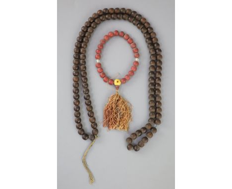 A Sino-Tibetan Buddhist seed bead rosary, 19th century and a Chinese composition bead rosary, early 20th century 65cm drop, a