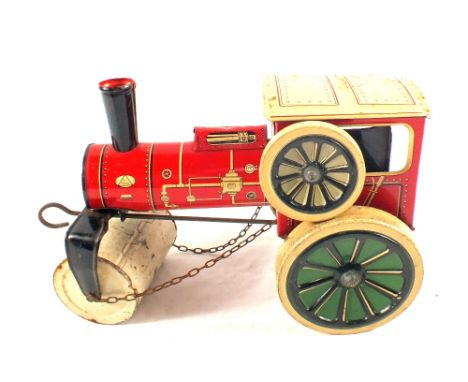 A German tin plate road roller, red and cream, green wheels