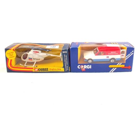 A boxed Corgi promo van, National Exhibition Centre and 9212 Hughes 369 helicopter (Dutch issue)