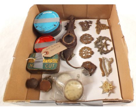 A mixed lot including buttons, badges, pocket watches and a Trench Art lighter