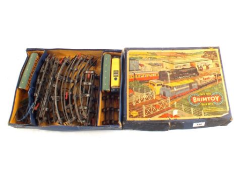 A boxed Brimtoy electric train set