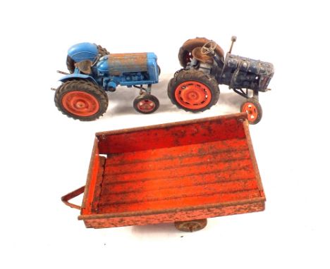 A Chad Valley die cast tractor plus one other and a tin plate cart (for restoration)