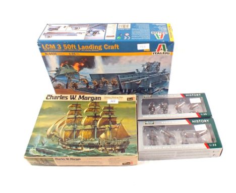 A boxed Italeri LCM 3 soft landing craft model, a Revell Charles W Morgan whaling ship model and two Oryan WWII lead soldier 