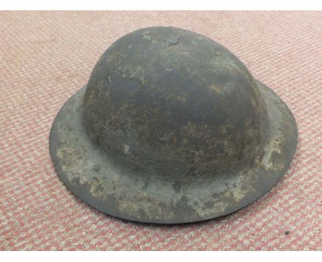 WWI British Brodie helmet complete with lining and chin strap