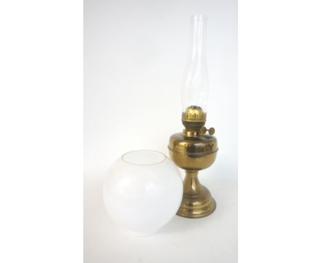 DUPLEX OIL LAMP
with a brass body, clear glass stack and opaque glass shade, 51cm high