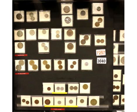 Coins of Scandinavian countries, including Norway, Denmark, Sweden, Iceland and others. All mounted in sleeves onto three boa
