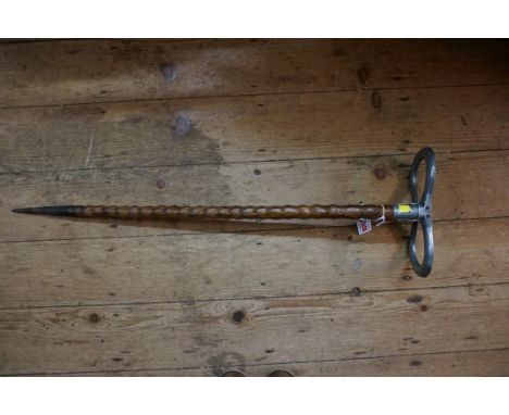 A vintage blackthorn and aluminium shooting stick,&nbsp;the folding top of horseshoe design.&nbsp; 