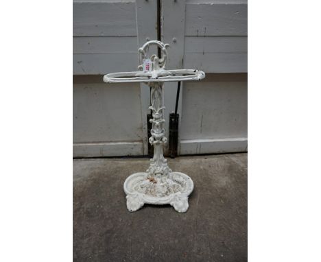 An old white painted cast iron stick stand.&nbsp; 