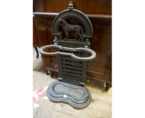 A cast iron stick stand,&nbsp;inscribed 'The Favourite', 80cm high.&nbsp; 