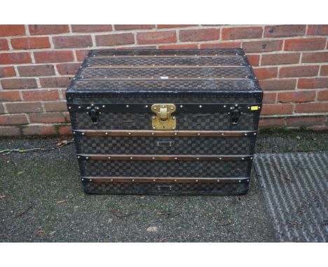 A Louis Vuitton travelling trunk, circa 1890, in Damier canvas, with paper label to the interior inscribed 'No. 32432', 58cm 