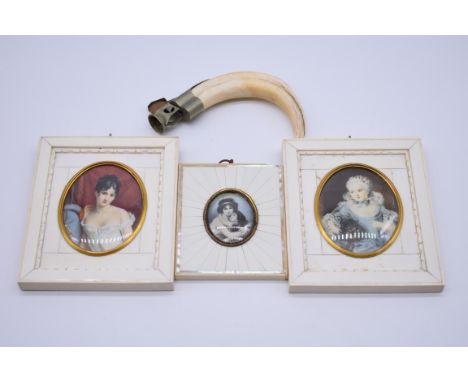 A pair of ivory framed portrait miniatures,&nbsp;8.2 x 6.3cm oval; together with another portrait miniature; and a boar's tus