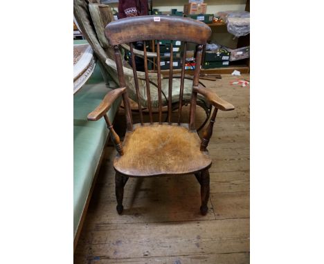 A Victorian beech and elm stick back kitchen chair.&nbsp; 