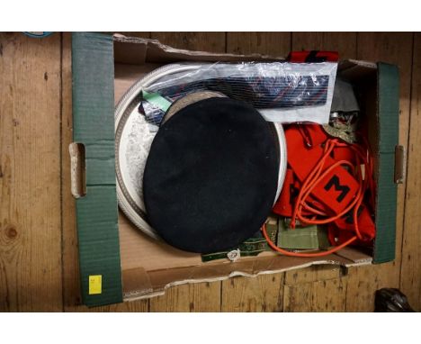 A vintage Royal Military Police officer's cap, uniform and associated items; together with a metal travelling trunk. 